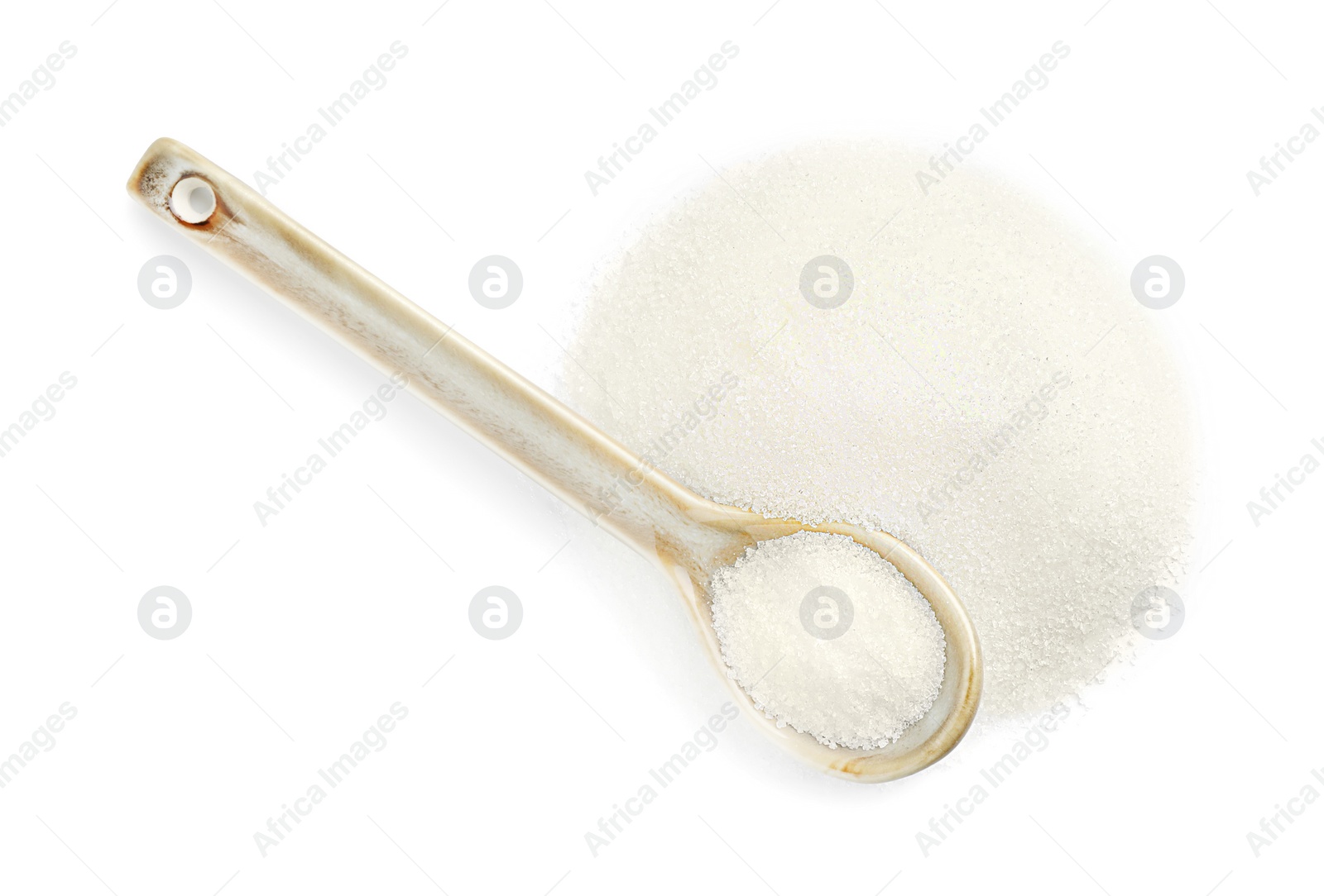 Photo of Spoon with granulated sugar isolated on white, top view