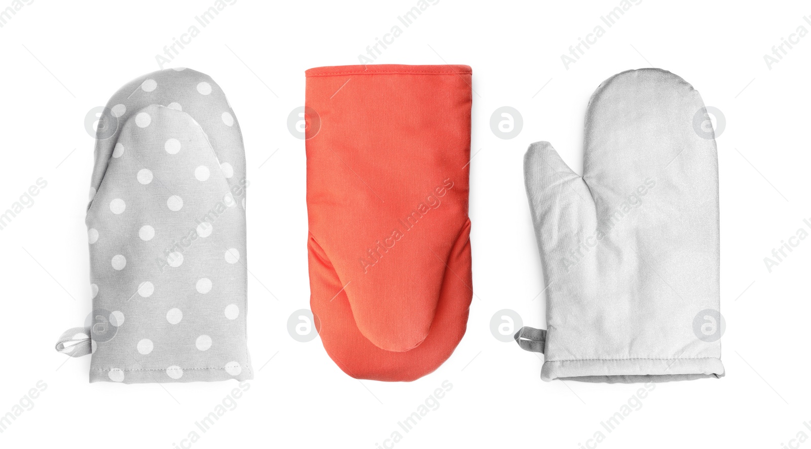 Image of Set with different oven gloves on white background, top view. Banner design