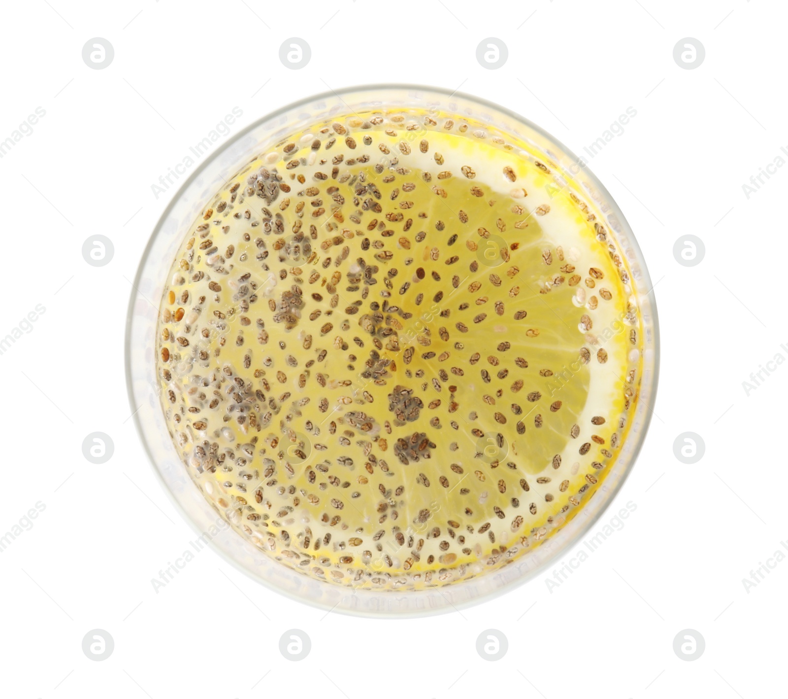 Photo of Glass of water with chia seeds on white background, top view