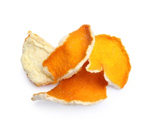 Photo of Pile of dry orange peels on white background, top view