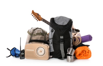 Photo of Set of camping equipment with sleeping bag on white background