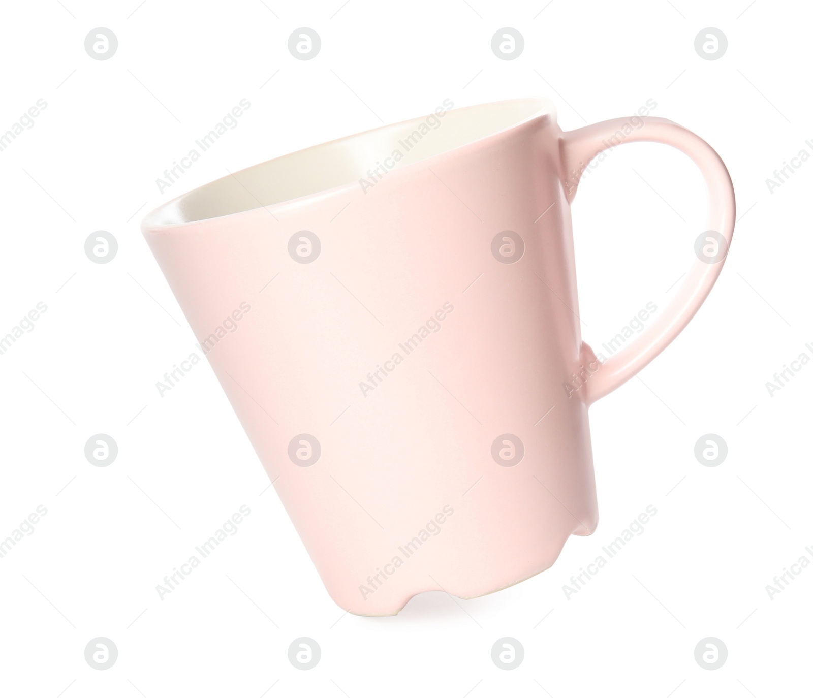 Photo of Clean light pink cup isolated on white