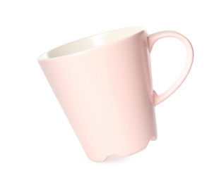Photo of Clean light pink cup isolated on white