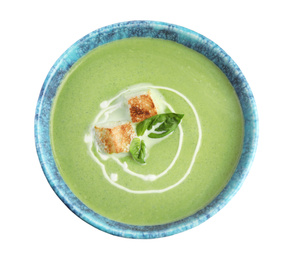 Photo of Delicious broccoli cream soup with croutons isolated on white, top view