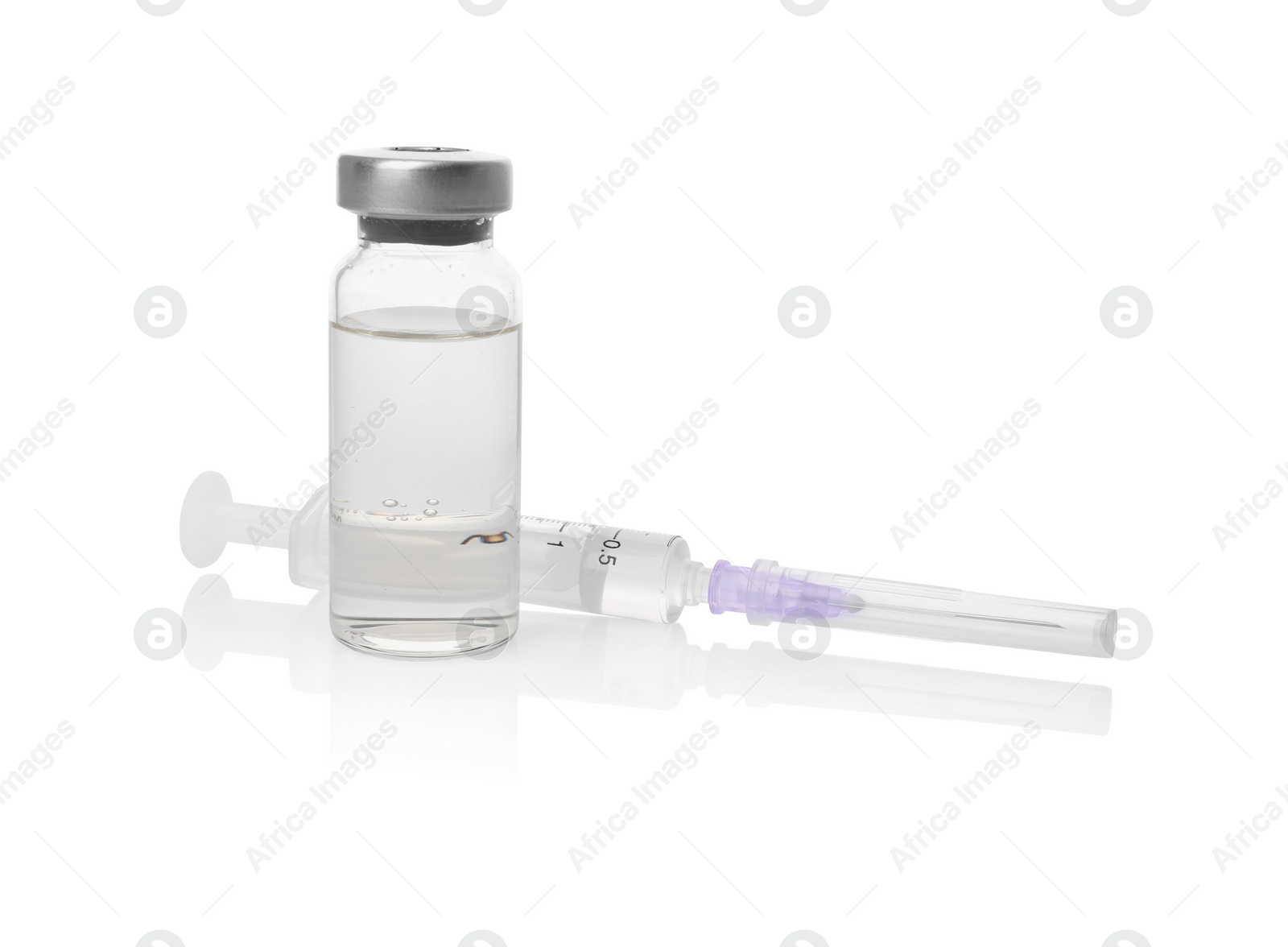 Photo of Disposable syringe with needle and vial isolated on white