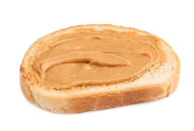 Slice of bread with peanut butter on white background