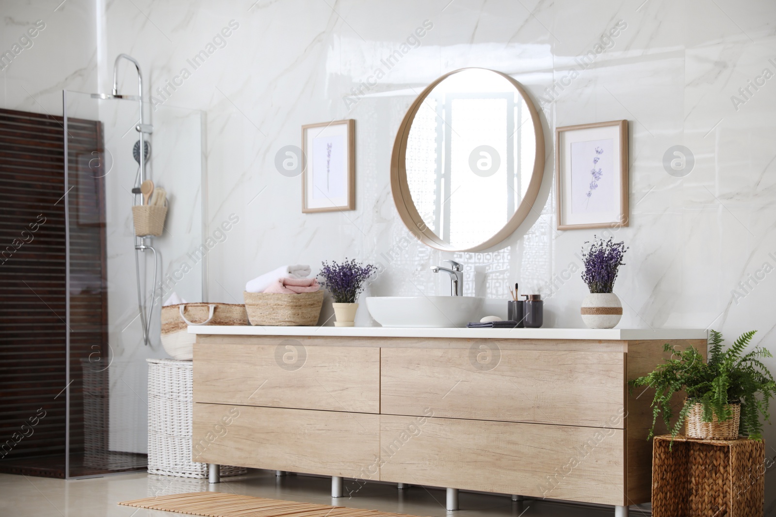 Photo of Bathroom interior with shower stall and counter. Idea for design