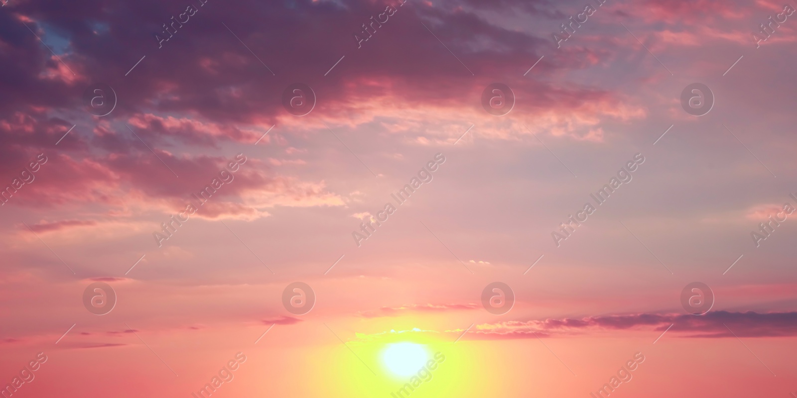 Image of Beautiful panorama of sky with clouds at sunset. Banner design