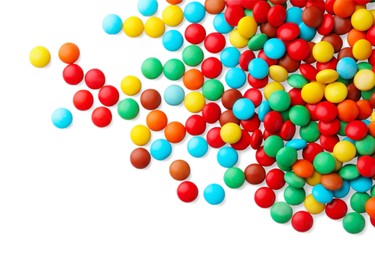 Photo of Many small colorful candies on white background, top view