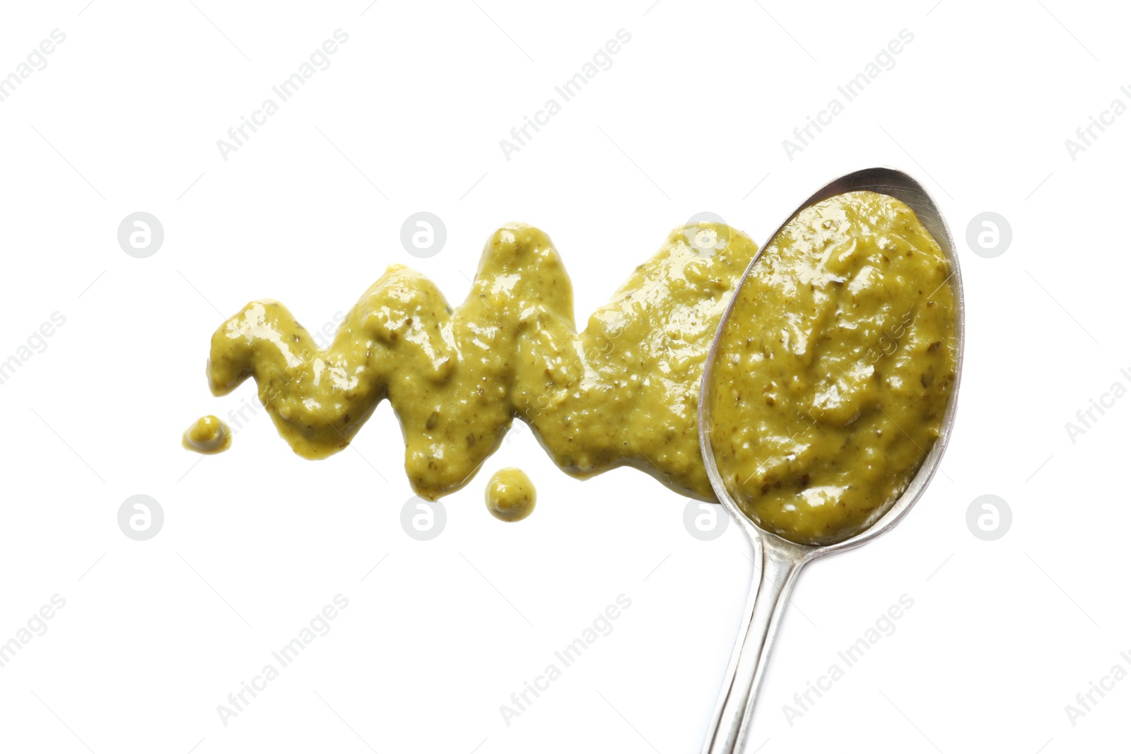 Photo of Delicious pesto sauce and spoon on white background, top view