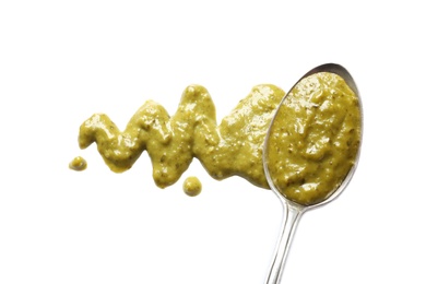 Photo of Delicious pesto sauce and spoon on white background, top view