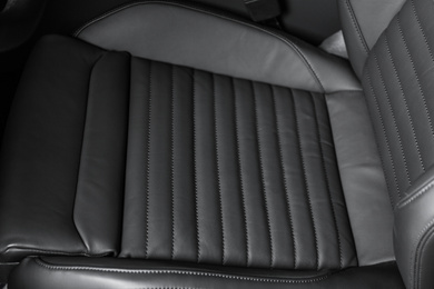 Car seat with leather upholstery, closeup view