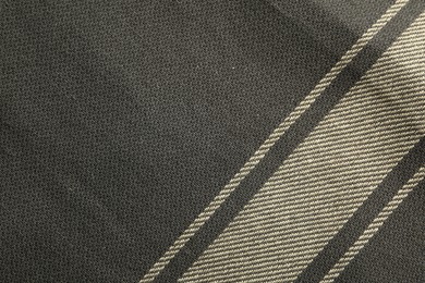 Photo of Texture of dark fabric with stripes as background, closeup