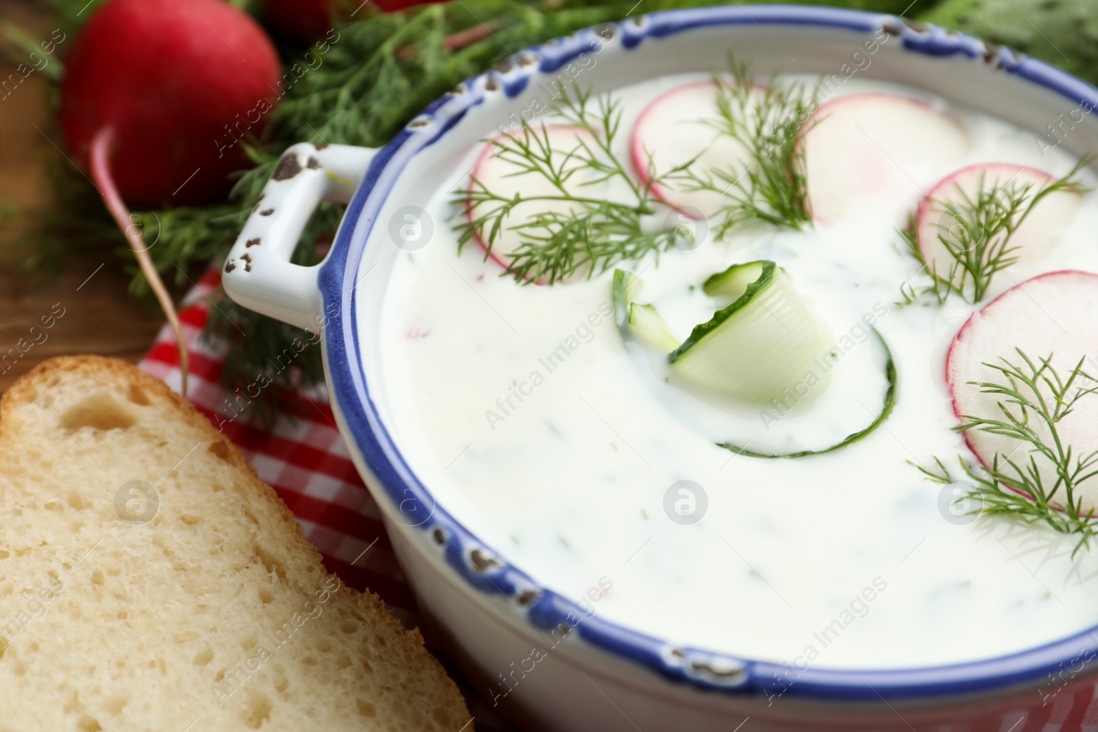 Photo of Delicious cold summer soup in bowl, closeup