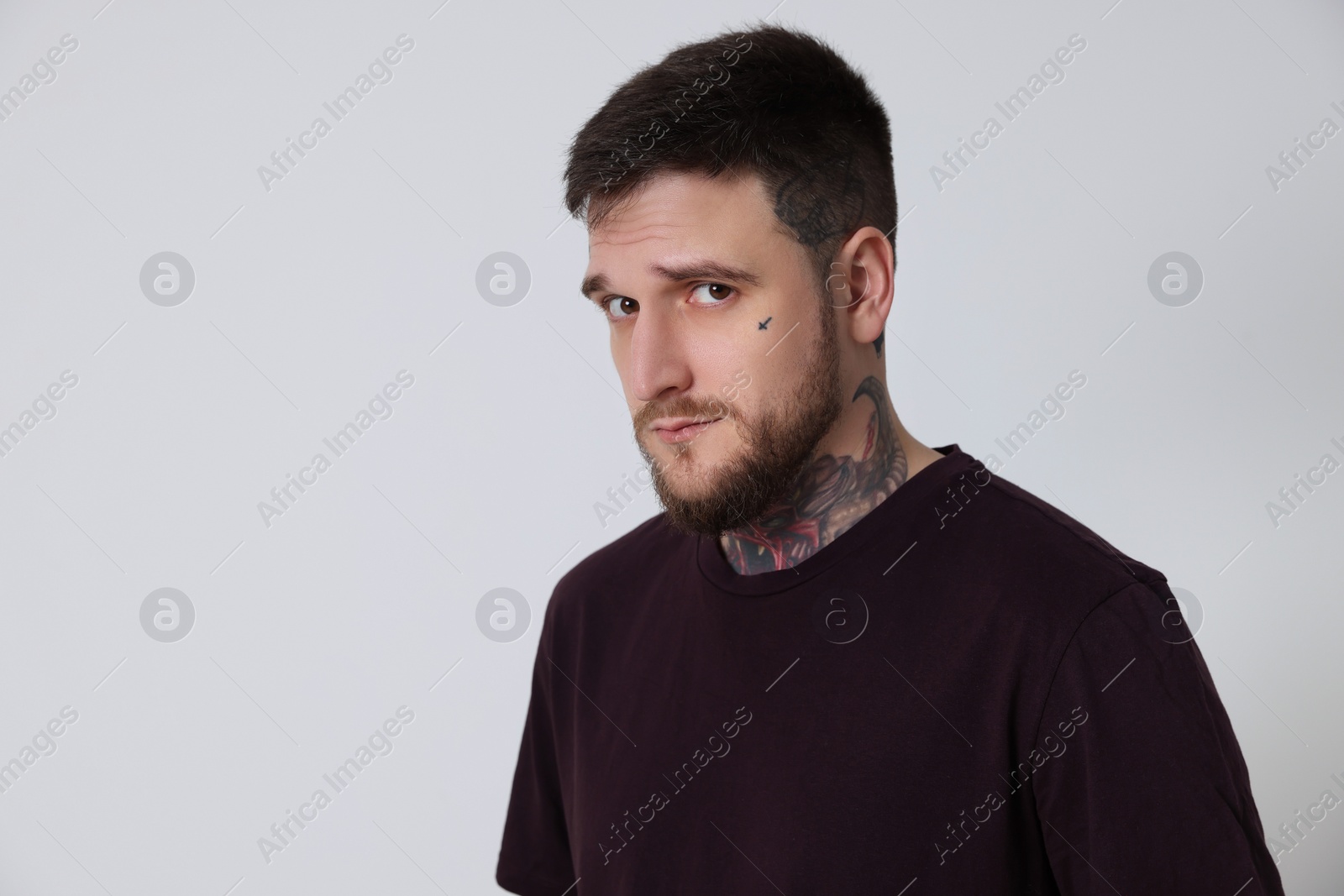 Photo of Portrait of hipster man on light grey background. Space for text