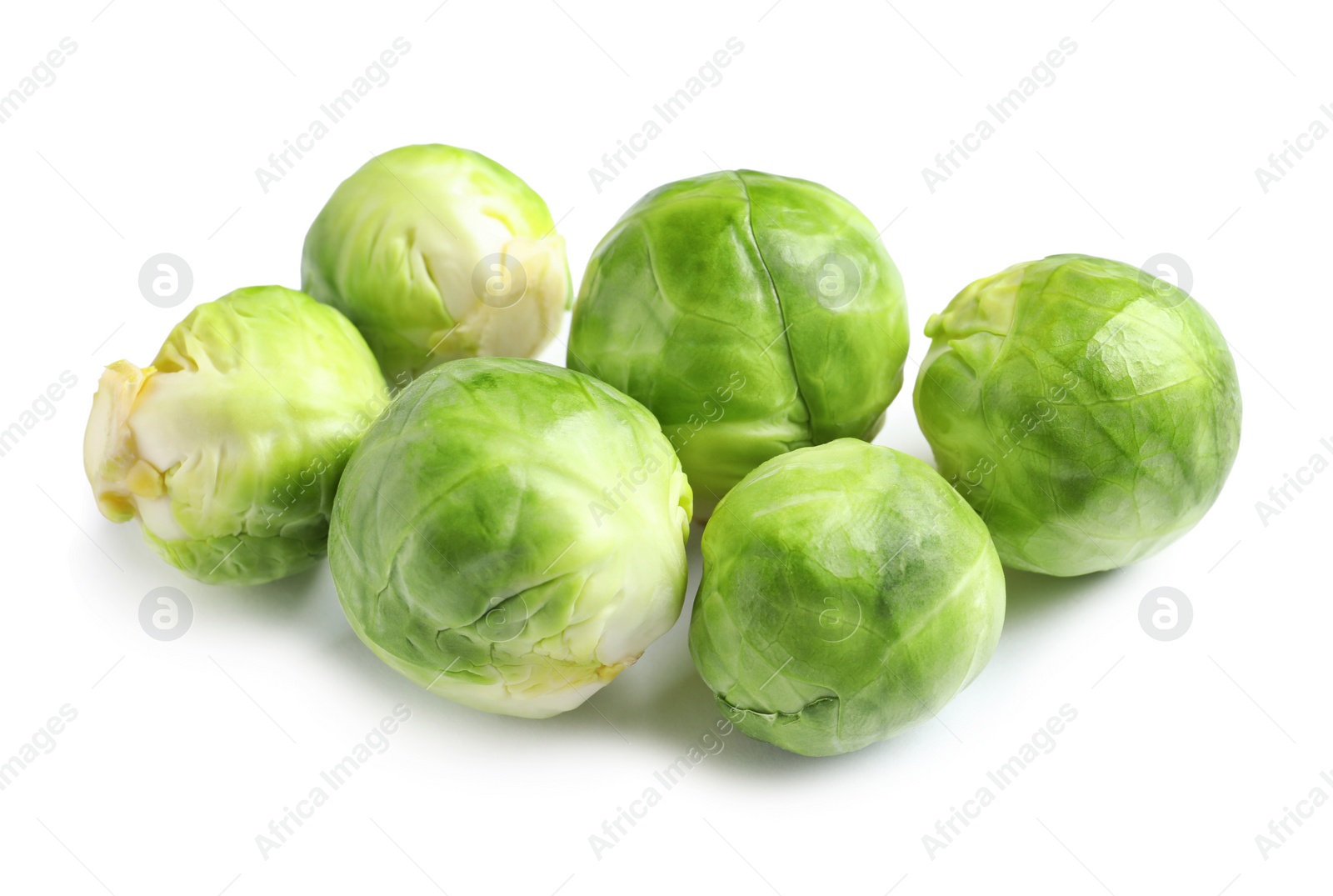 Photo of Fresh tasty Brussels sprouts on white background