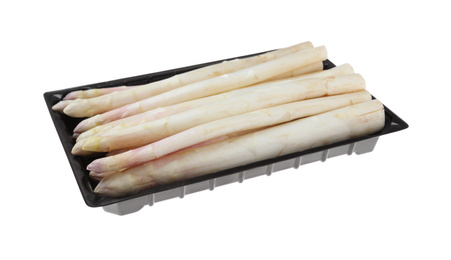 Photo of Fresh ripe asparagus in plastic pack isolated on white