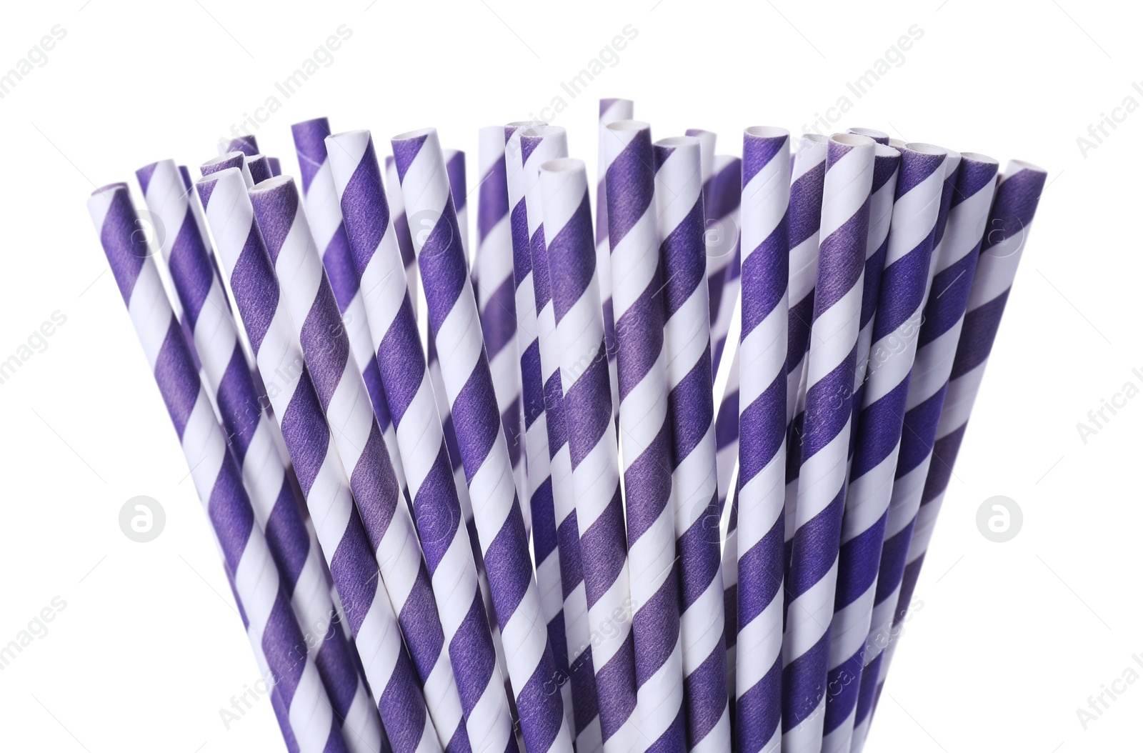 Photo of Striped paper cocktail tubes on white background