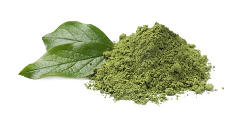 Photo of Pile of green matcha powder and leaves isolated on white