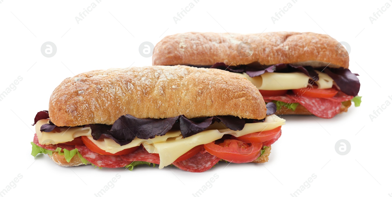 Photo of Delicious sandwiches with cheese, salami, tomato isolated on white