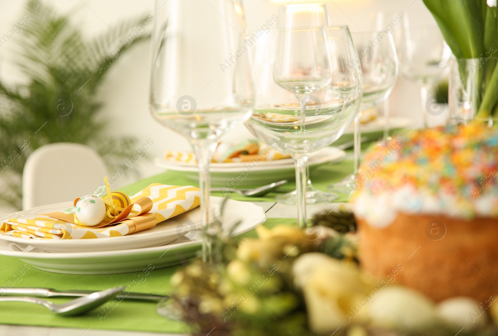 Photo of Beautiful festive Easter table setting with eggs