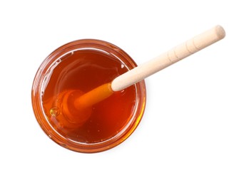 Photo of Tasty natural honey and dipper in glass jar on white background, top view