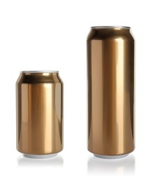 Stylish golden aluminum beverage cans on white background