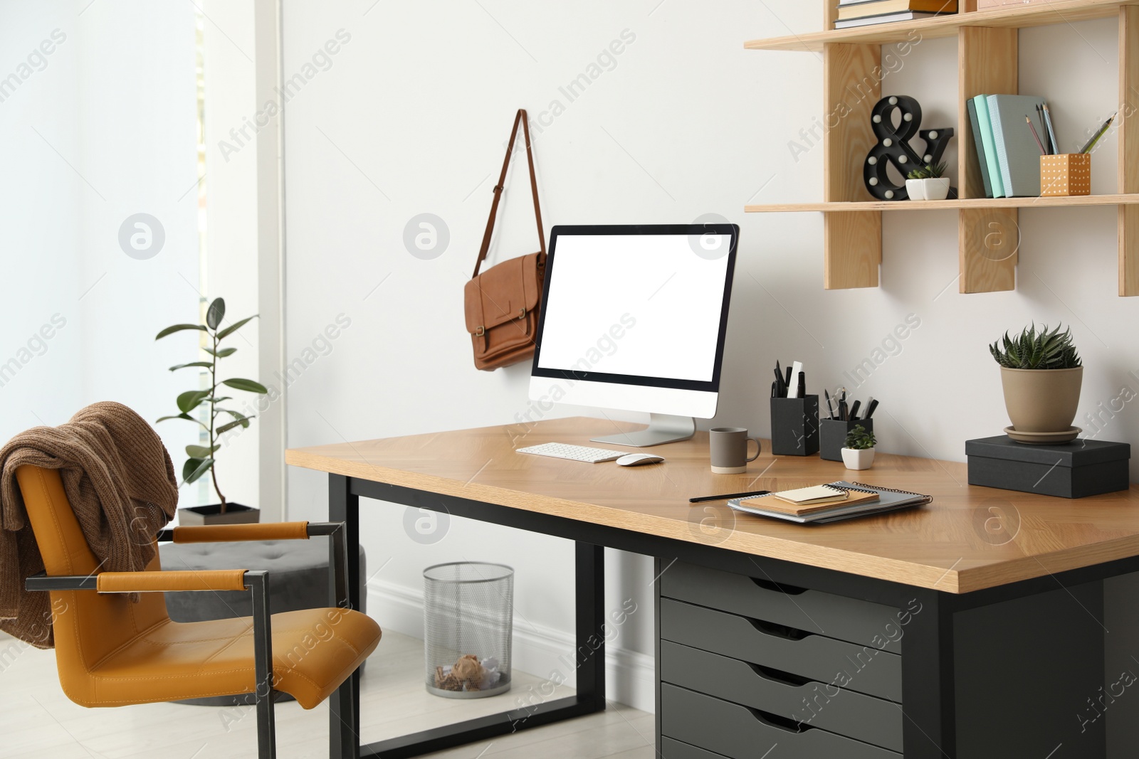 Photo of Stylish room interior with modern comfortable workplace