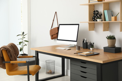 Photo of Stylish room interior with modern comfortable workplace