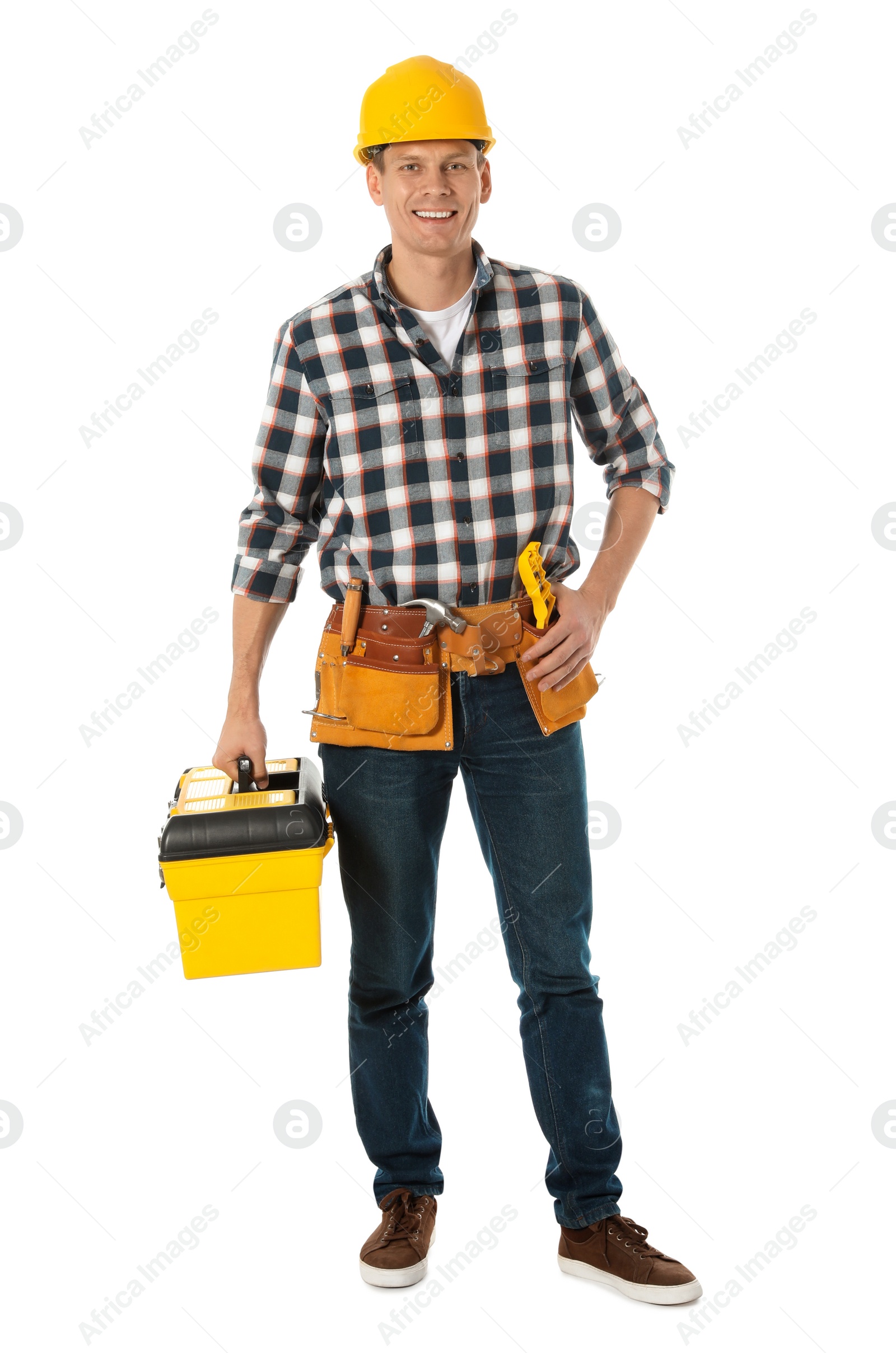 Photo of Handsome carpenter with tool box isolated on white