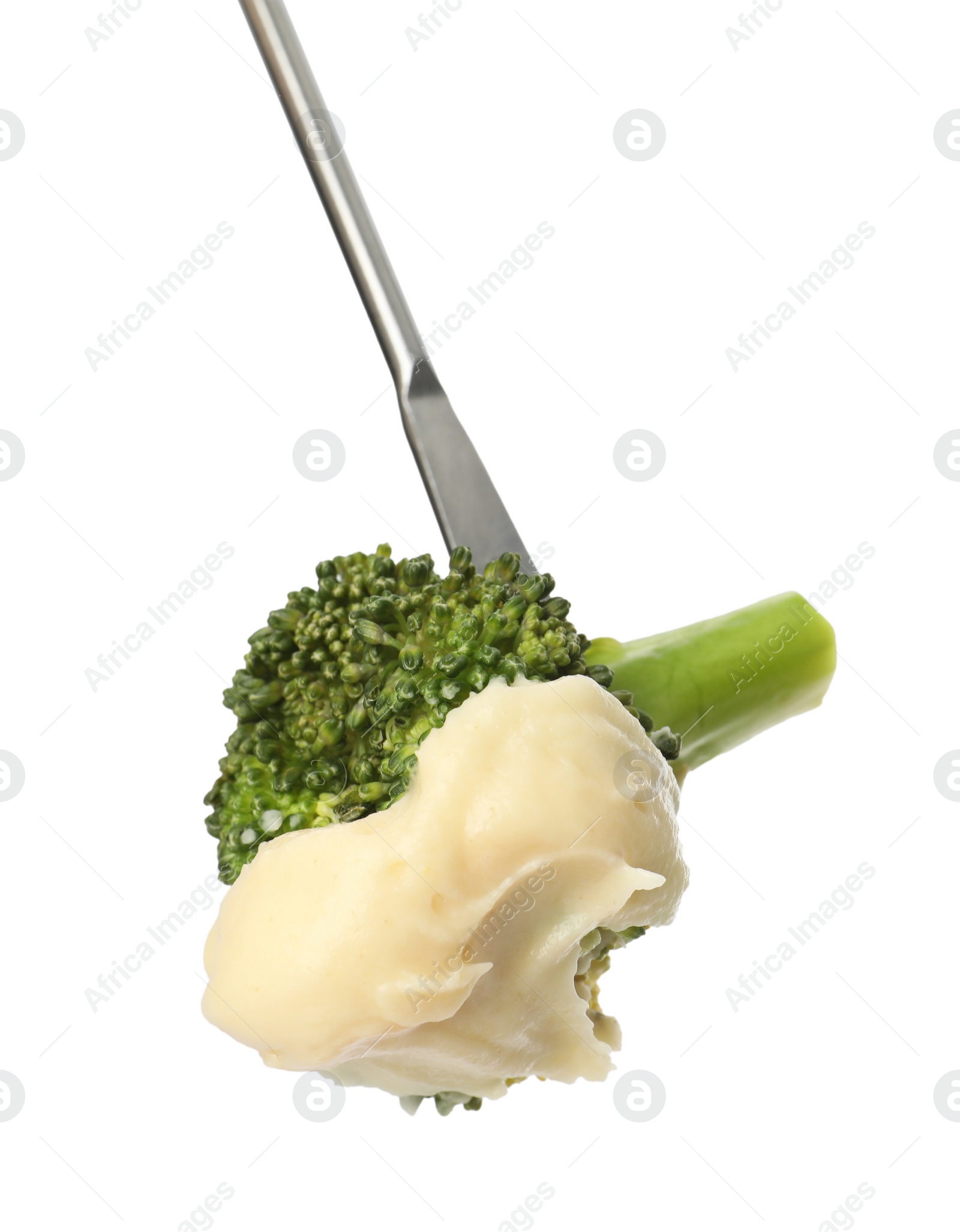 Photo of Tasty fondue. Fork with broccoli and melted cheese isolated on white