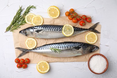 Photo of Flat lay composition with tasty raw mackerel on white textured table