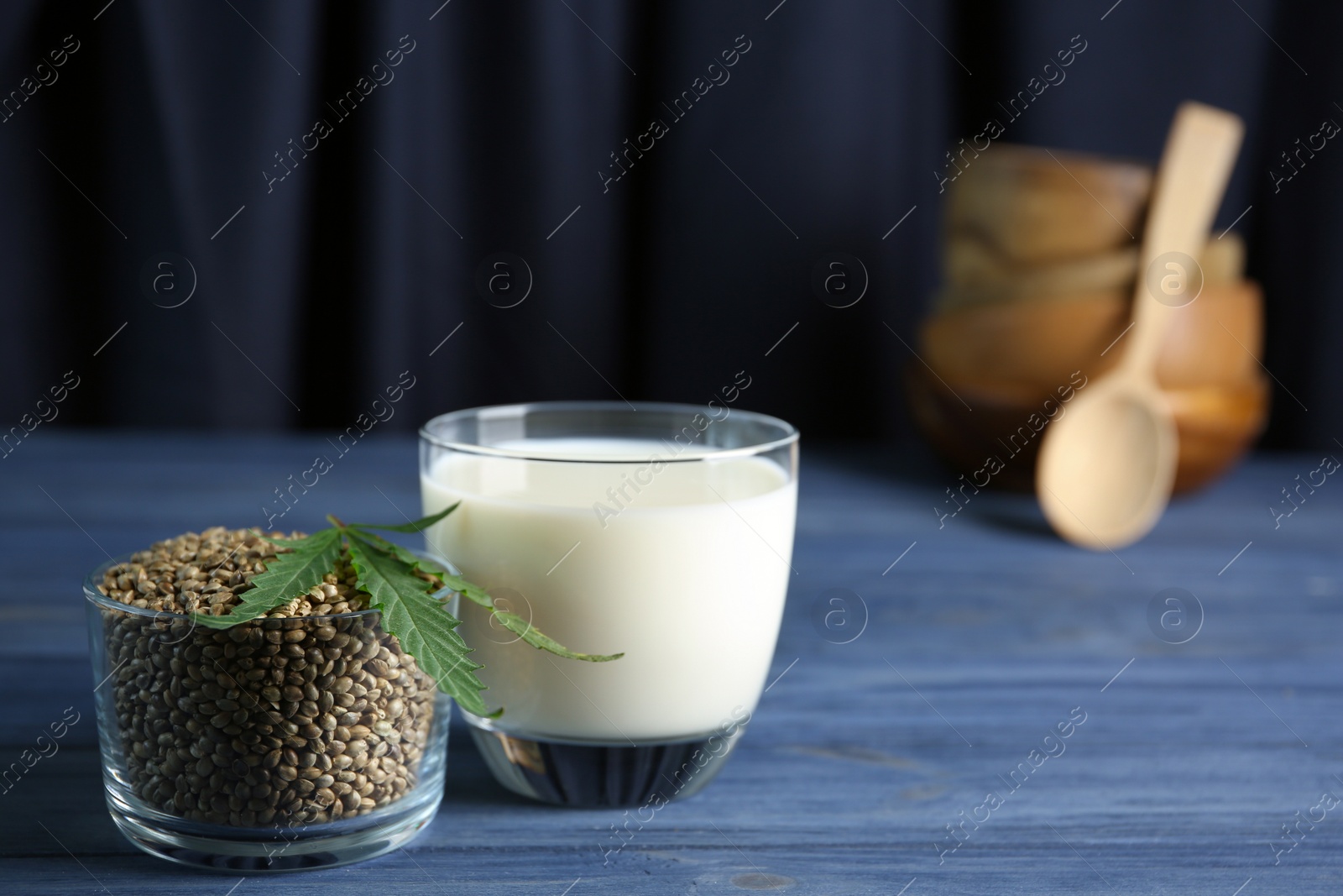 Photo of Composition with hemp milk and seeds on table