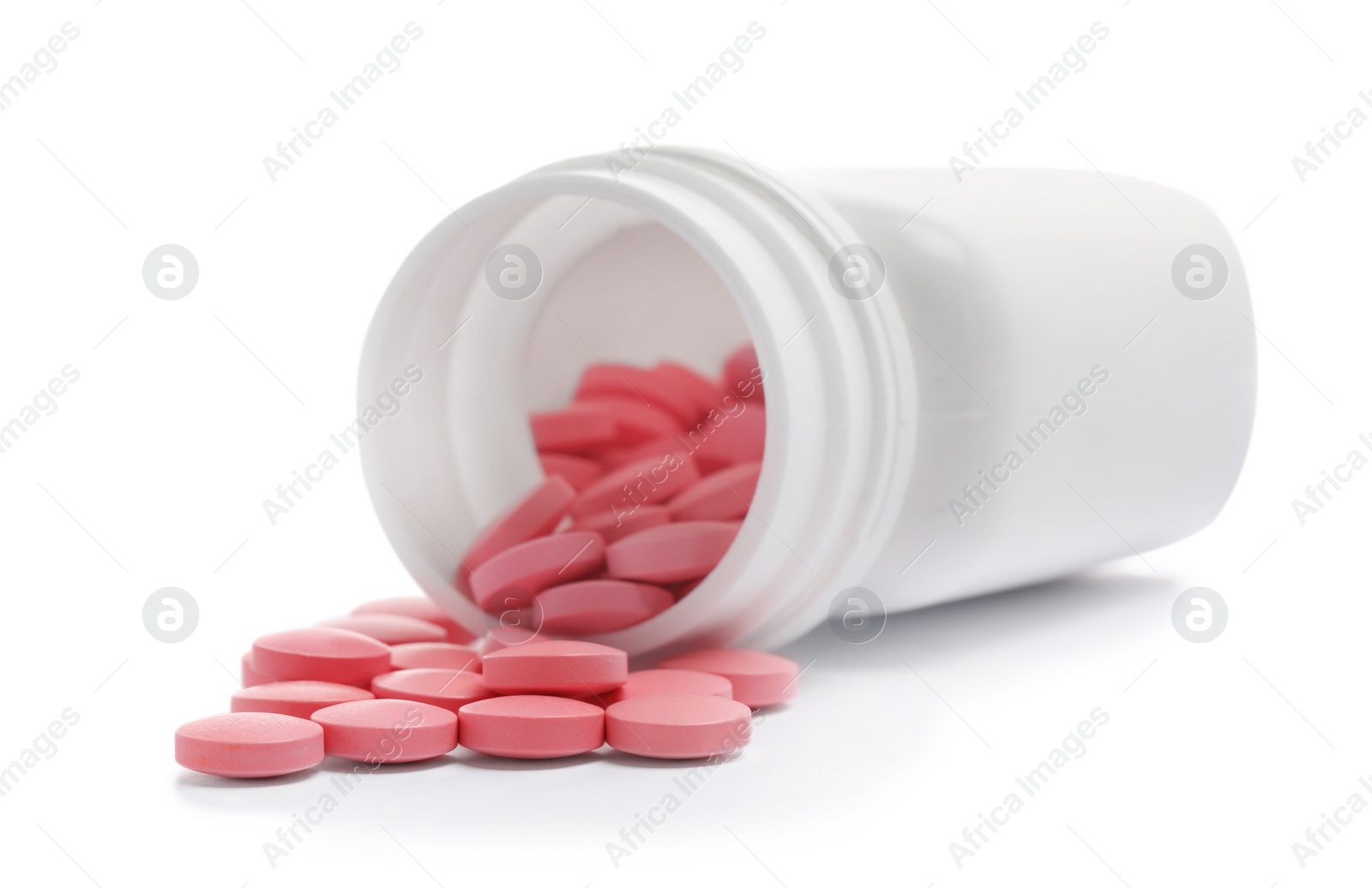 Photo of Pills and bottle on white background. Medical treatment