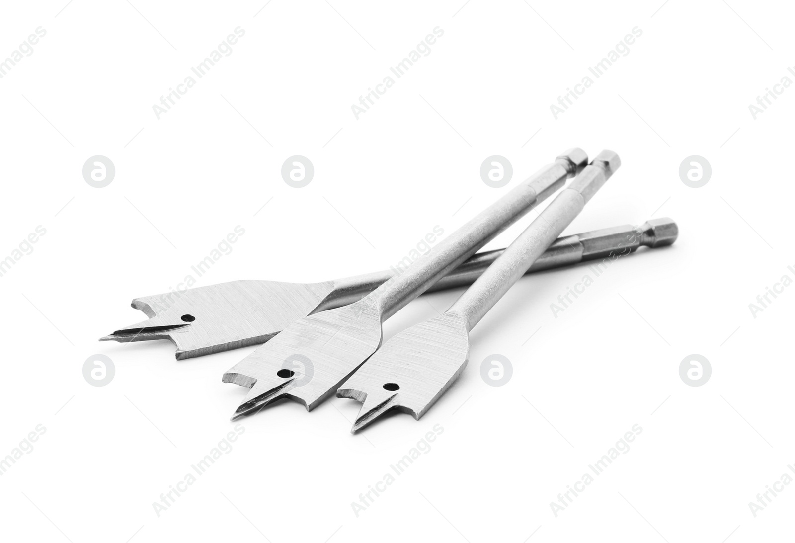 Photo of Spade drill bits isolated on white. Carpenter's tools