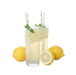 Photo of Natural lemonade with mint and fresh fruits on white background. Summer refreshing drink