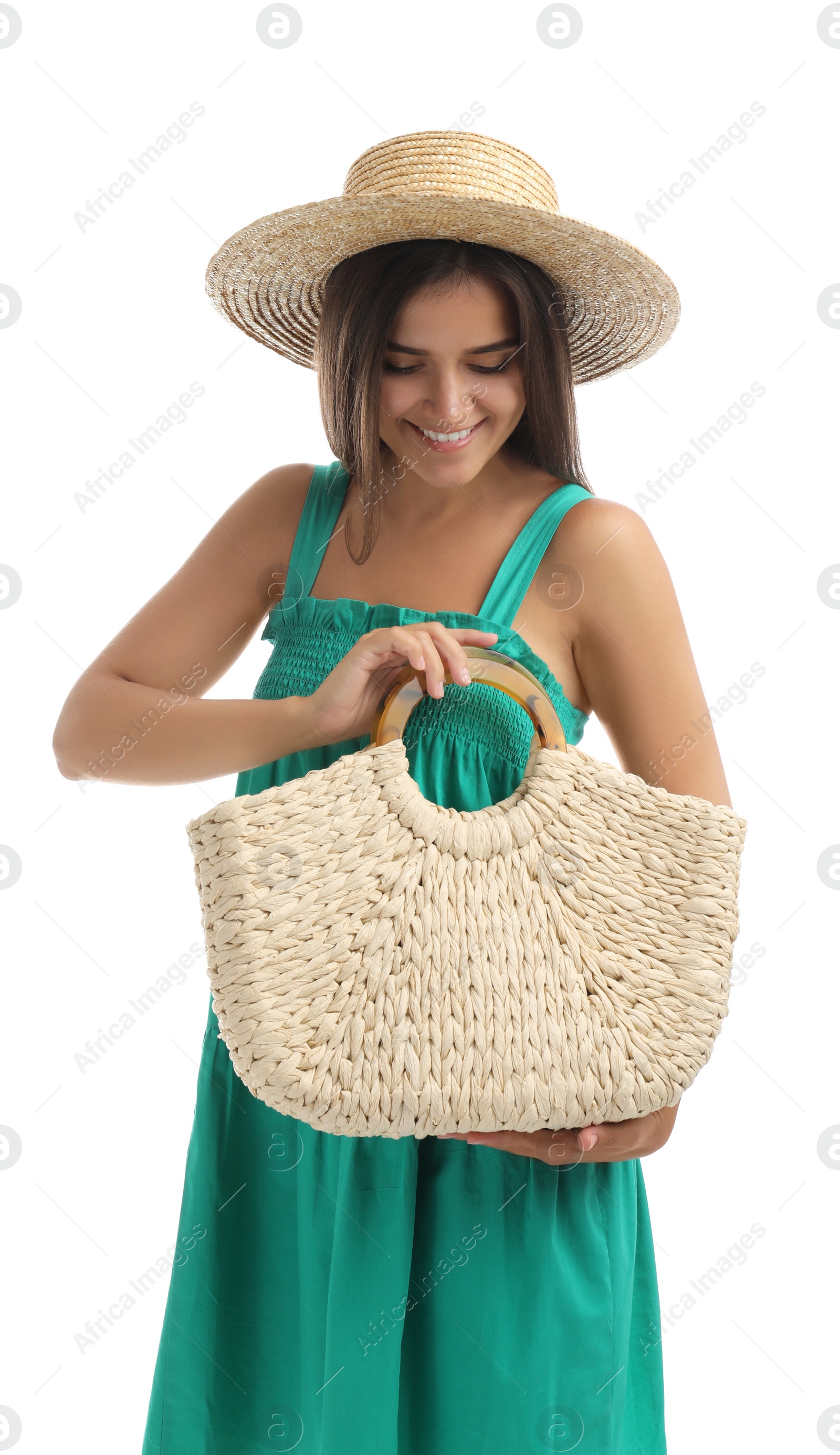 Photo of Young woman with stylish straw bag on white background