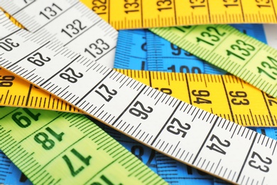 Photo of Different measuring tapes, closeup