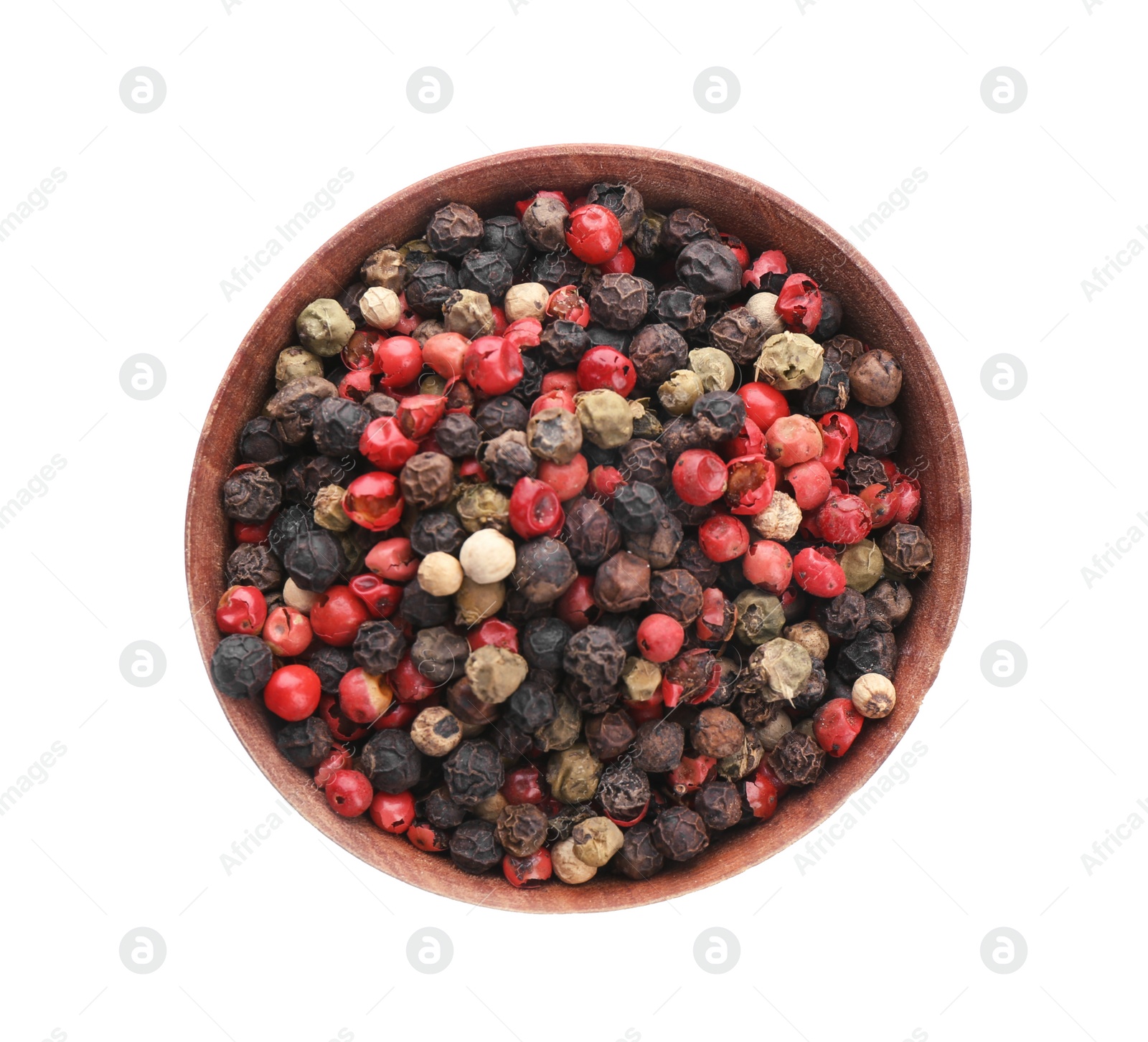 Photo of Wooden bowl with different pepper grains on white background, top view