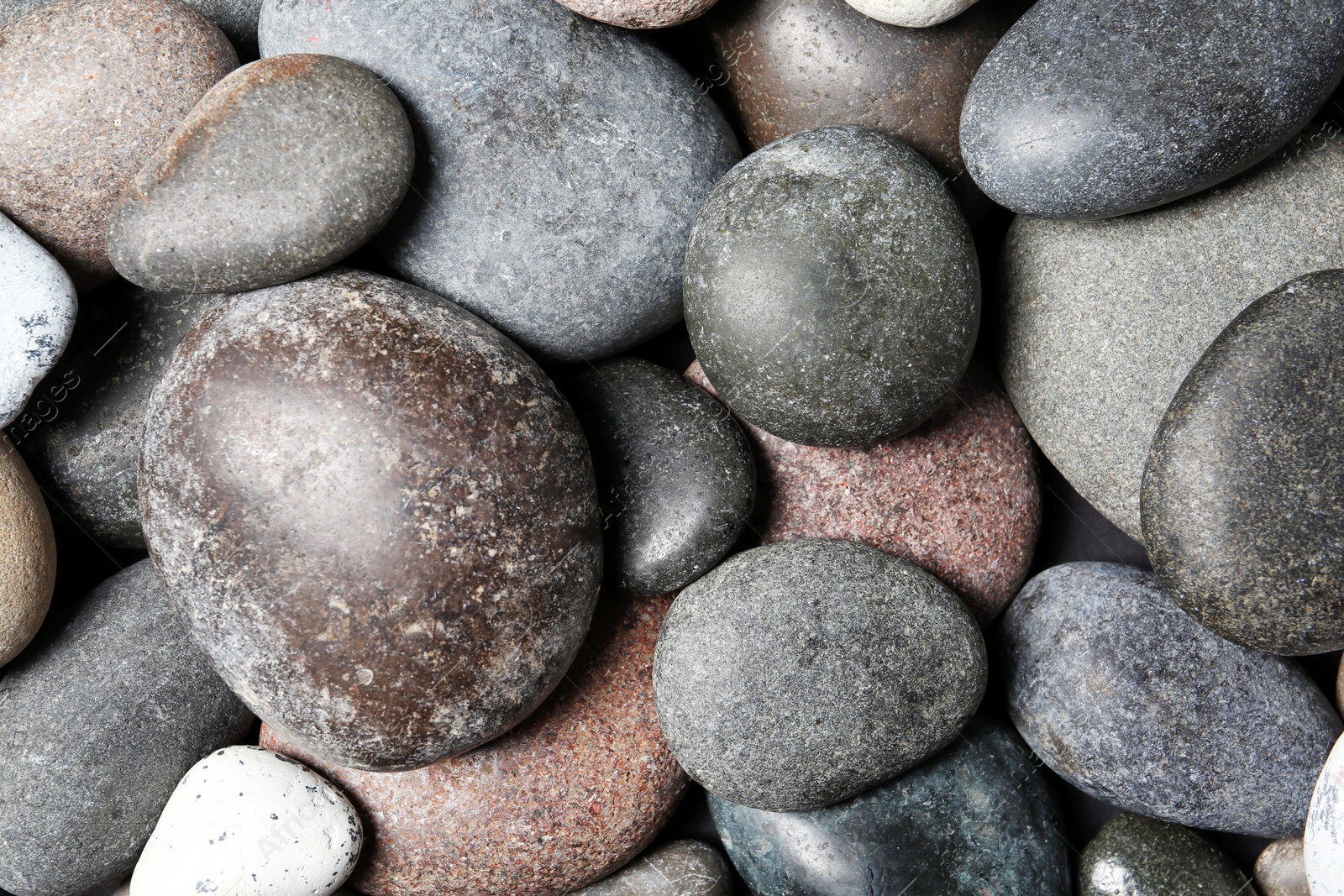 Photo of Composition with spa stones as background, top view