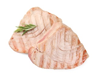 Photo of Delicious tuna steaks with rosemary isolated on white, top view