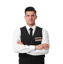 Portrait of happy receptionist in uniform on white background