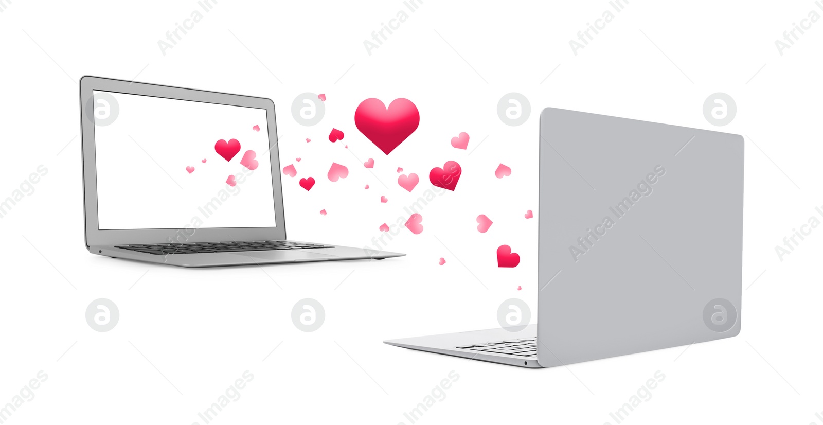 Image of Love in long distance relationship. Many hearts between laptops on white background