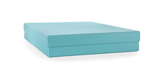 Photo of Elegant turquoise gift box isolated on white