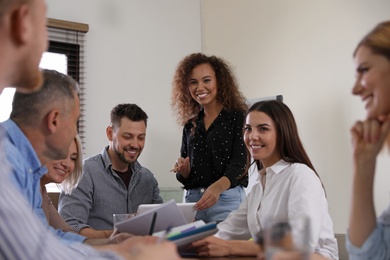 Photo of Portrait of volunteers having meeting in office