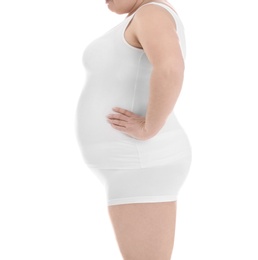Overweight woman on white background, closeup. Weight loss