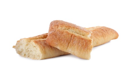 Photo of Pieces of fresh baguette on white background