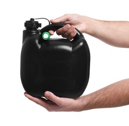 Man holding black canister on white background, closeup