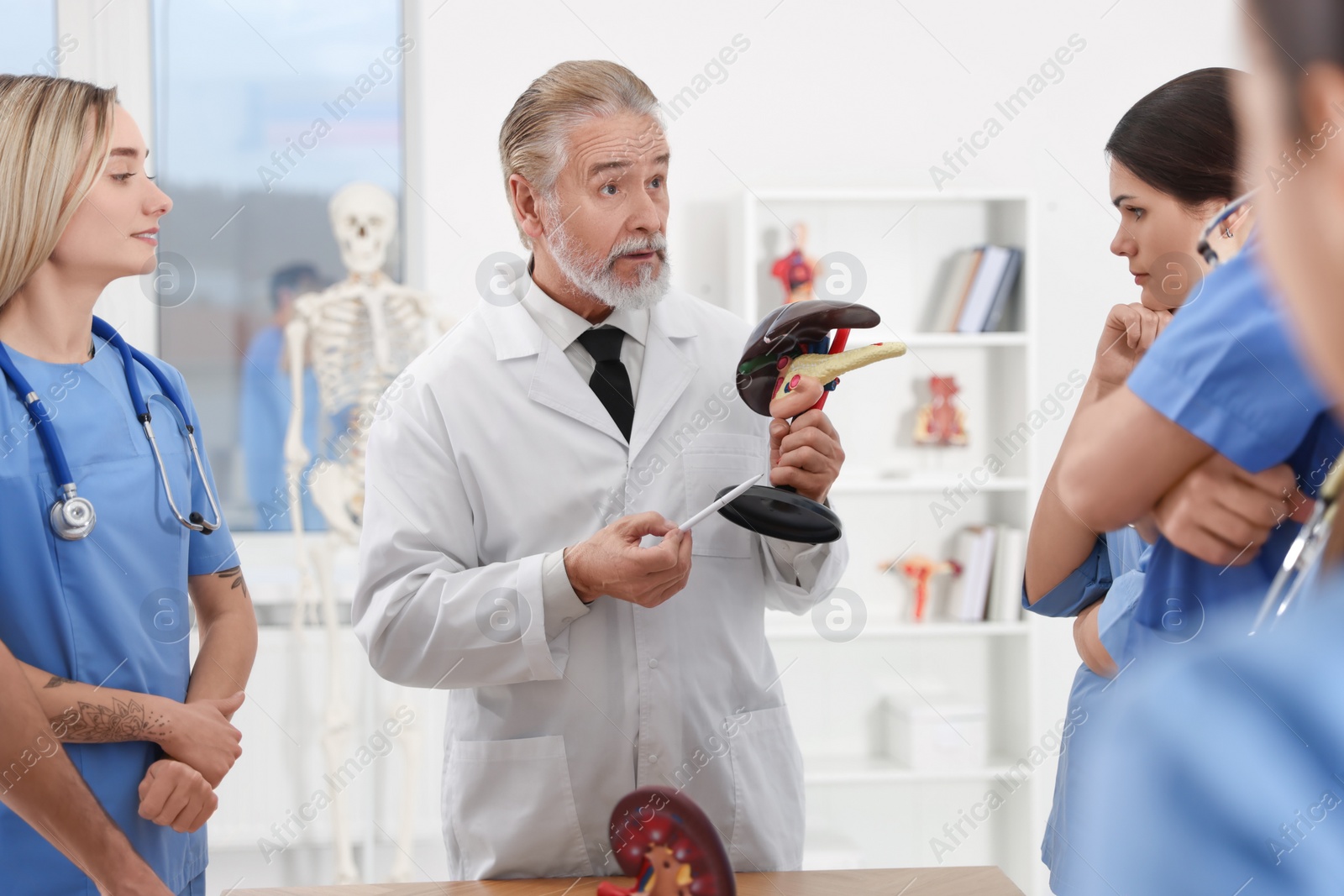 Photo of Doctor giving lecture for interns in university