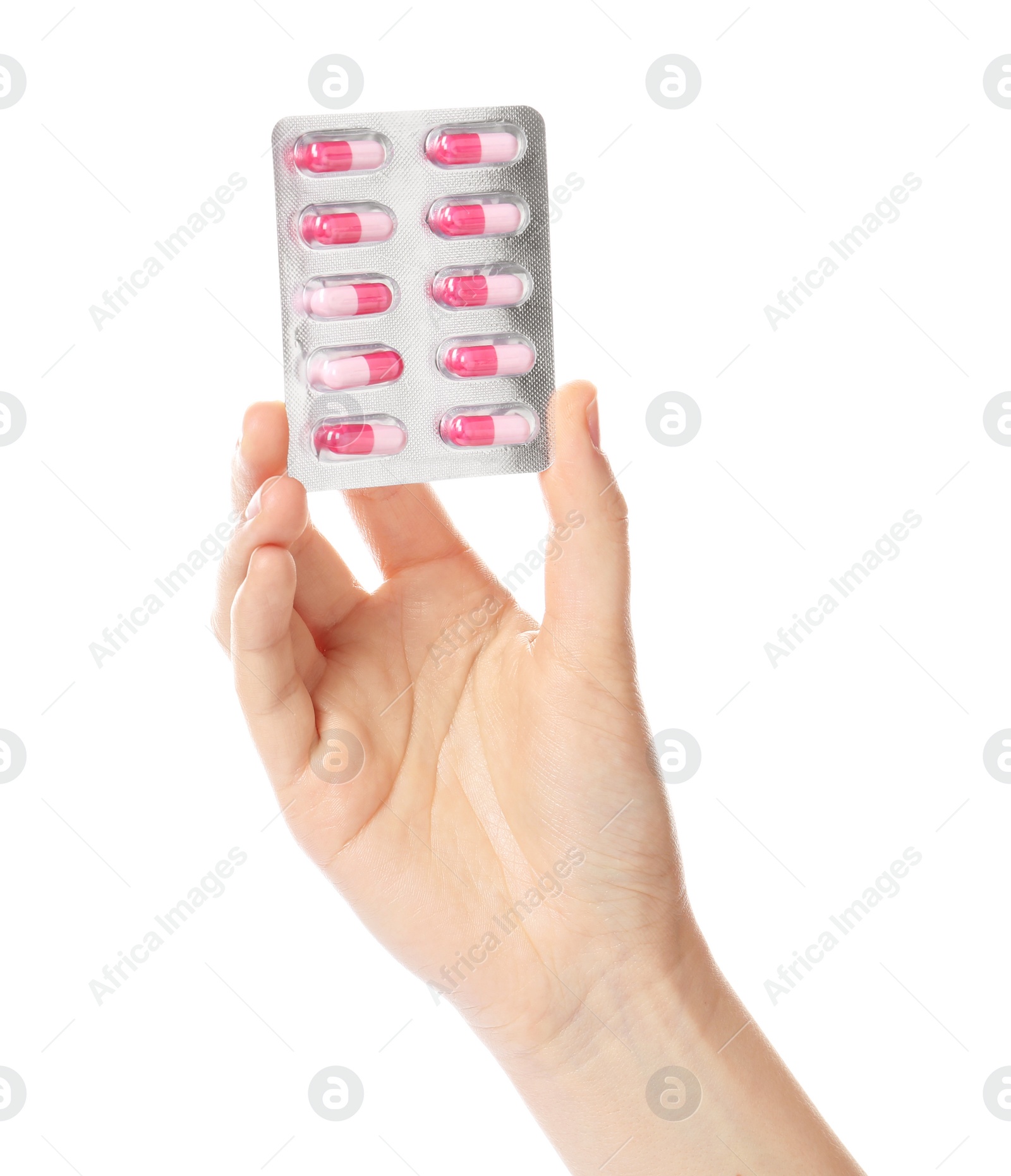 Photo of Woman holding pills in blister pack on white background, closeup